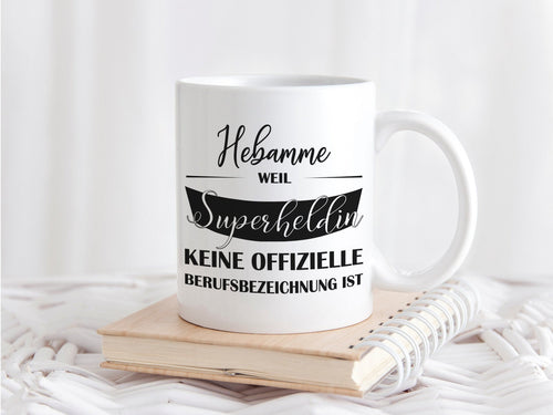 Kaffeetasse mit Spruch Hebamme weil Superheldin keine offizielle Berufsbezeichnung ist - Tachinedas Kreativshop