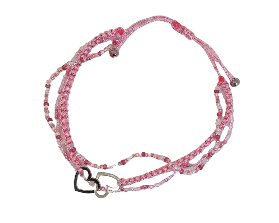 Makramee Armband rosa mit Anhänger und Perlen